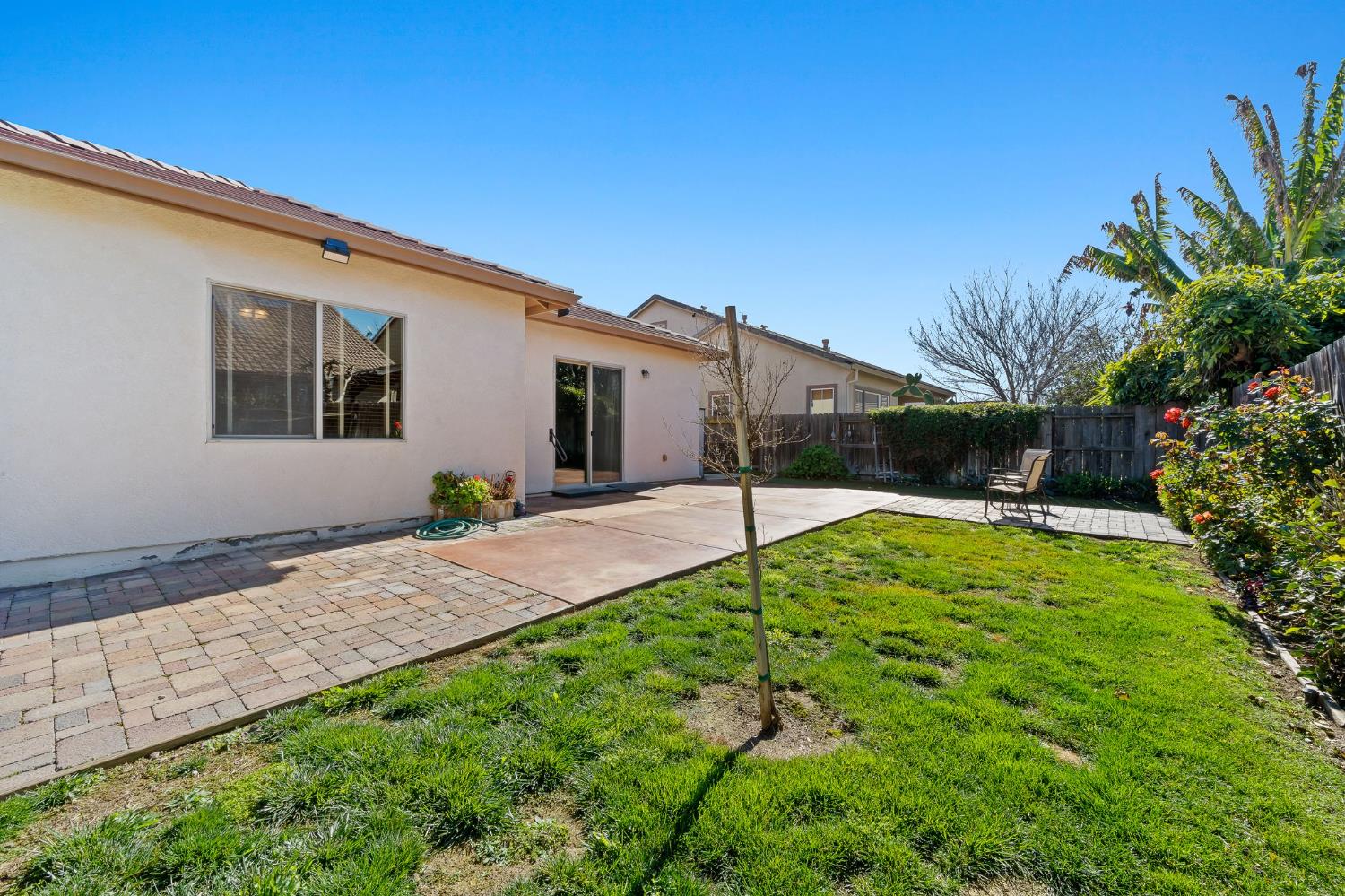 209 Fall Avenue Patterson, CA 95363 - Photo 35 of 48 a house view with a backyard space