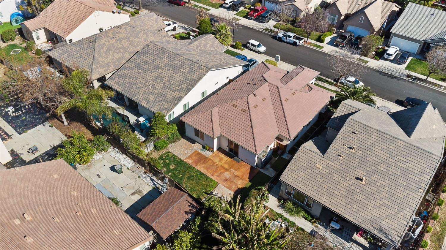 209 Fall Avenue Patterson, CA 95363 - Photo 41 of 48 an aerial view of a house with a garden