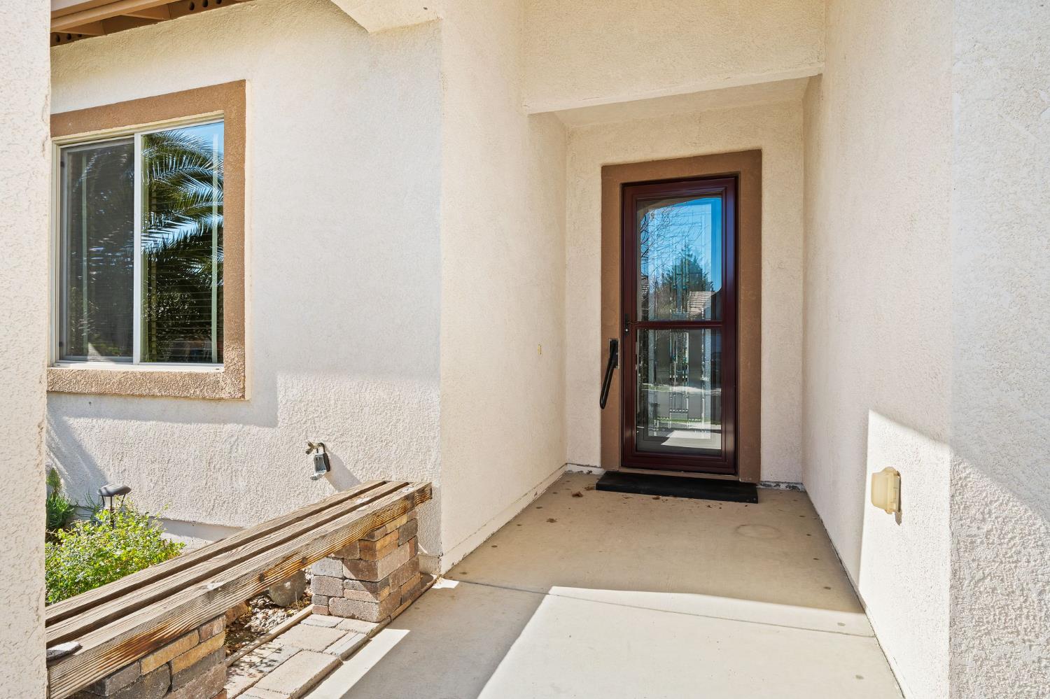 209 Fall Avenue Patterson, CA 95363 - Photo 6 of 48 a view of a front door of a house