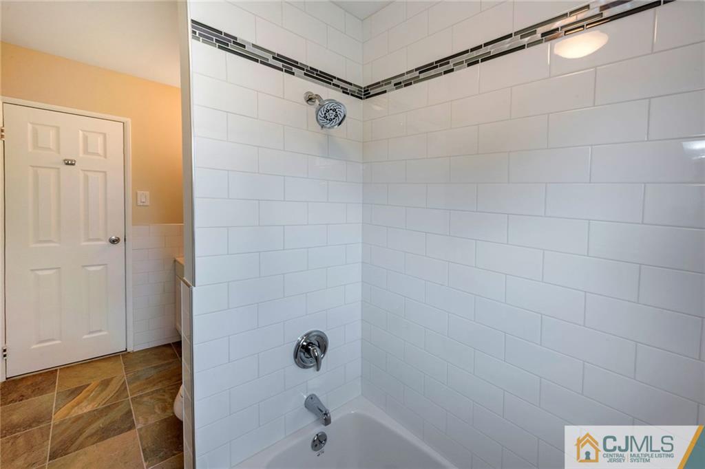 13 Barton Road Old Bridge, NJ 08857 - Photo 18 of 24 a bathroom with a shower and a bathtub
