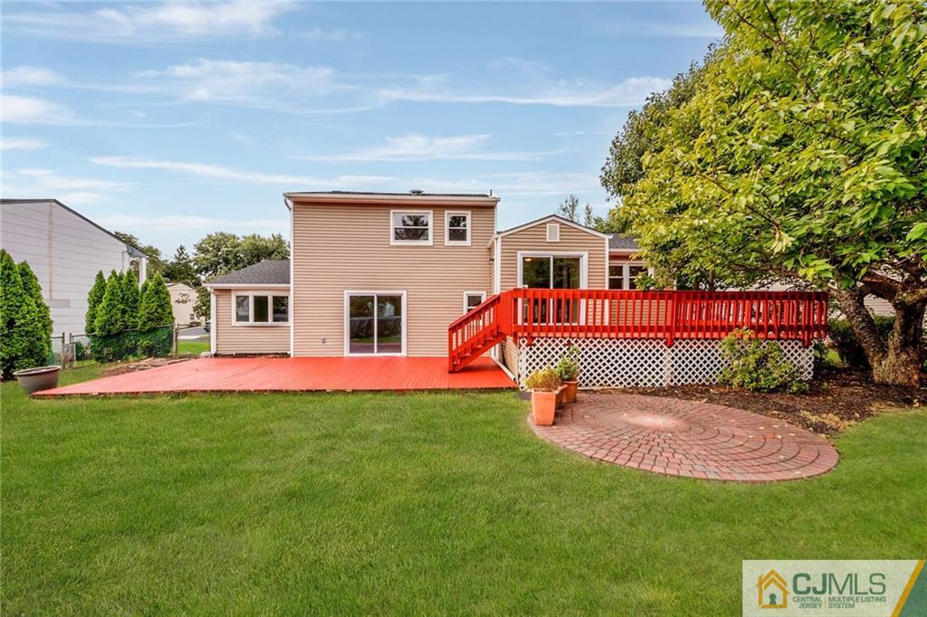 13 Barton Road Old Bridge, NJ 08857 - Photo 22 of 24 a view of a house with a yard