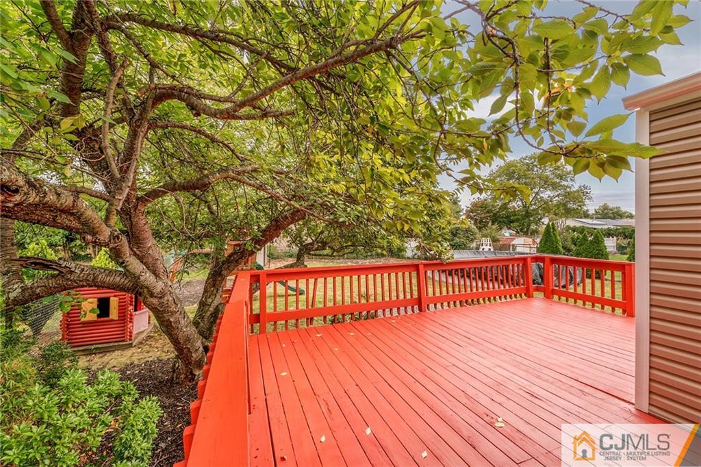 13 Barton Road Old Bridge, NJ 08857 - Photo 23 of 24 a view of balcony with wooden floor and outdoor space