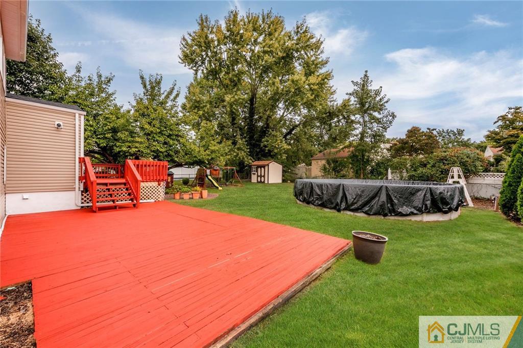 13 Barton Road Old Bridge, NJ 08857 - Photo 24 of 24 a view of a backyard with swimming pool