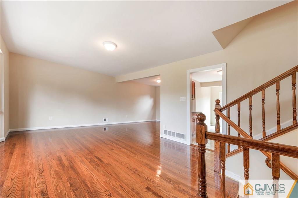 13 Barton Road Old Bridge, NJ 08857 - Photo 9 of 24 a view of an entryway with wooden floor