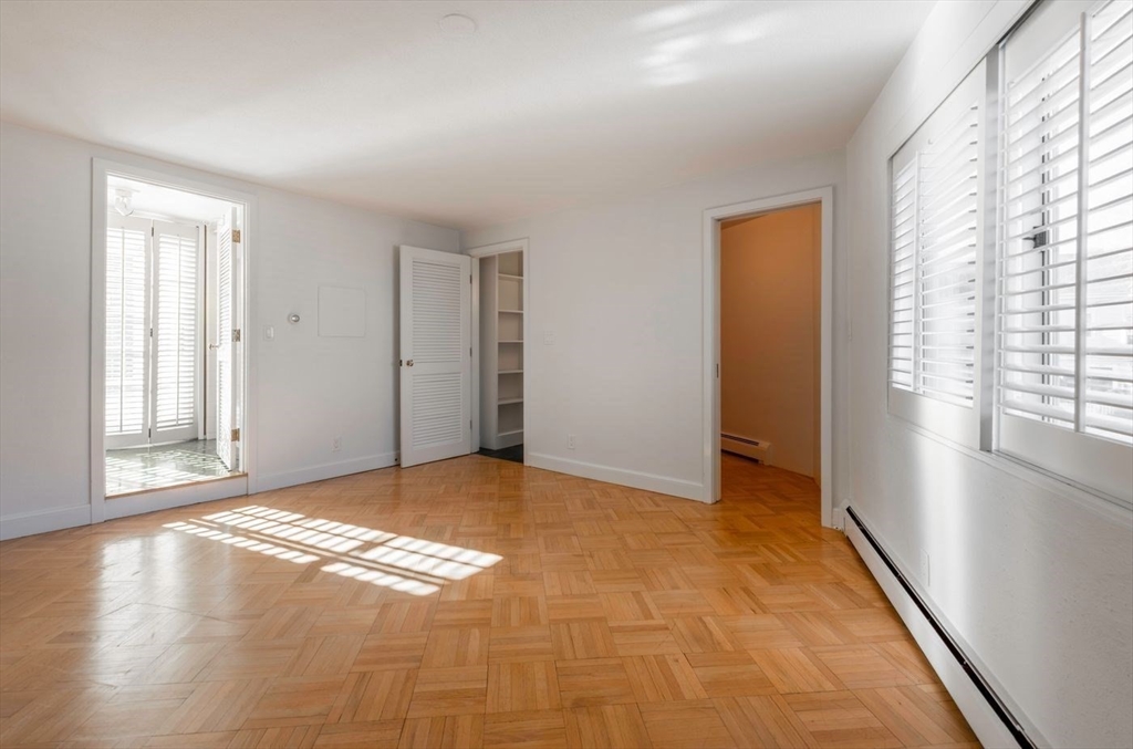 21 Central Street, Unit 1 Manchester, MA 01944 - Photo 14 of 24 a view of an empty room and window