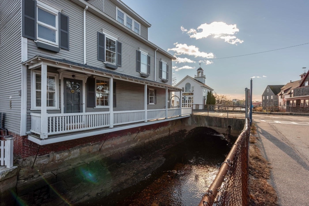 21 Central Street, Unit 1 Manchester, MA 01944 - Photo 23 of 24 a view of a house with swimming pool