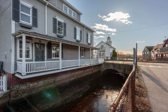 a view of a house with swimming pool
