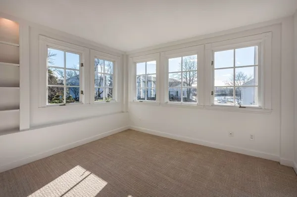 an empty room with windows