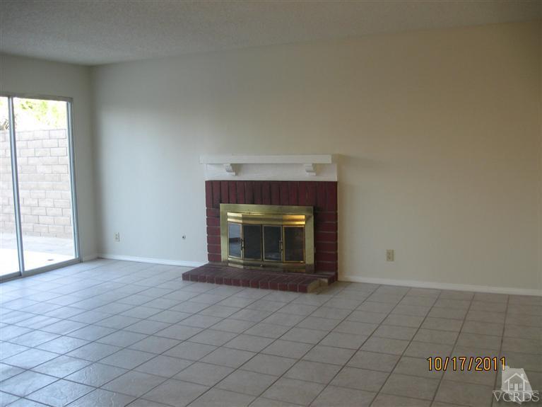 1151 Rivas Lane Oxnard, CA 93035 - Photo 4 of 11 an empty room with fireplace