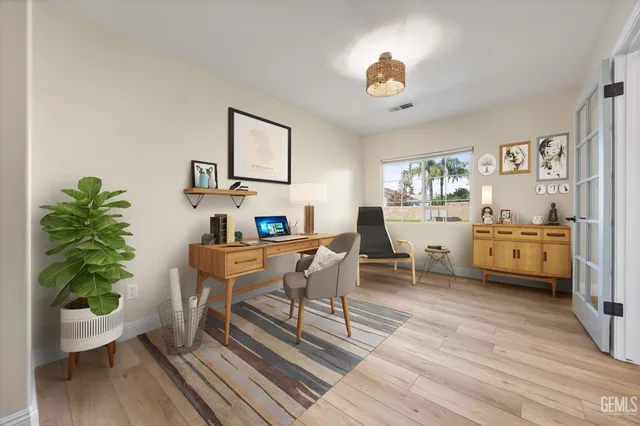 a kitchen with a stove and cabinets