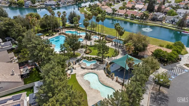 an aerial view of a house with a lake view
