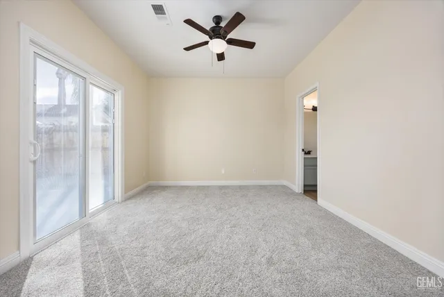 a view of a hallway with windows