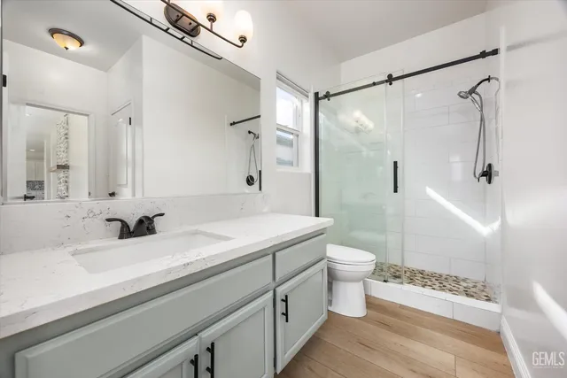 a view of a hallway with windows