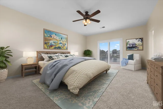 a bathroom with a sink a toilet and a large mirror