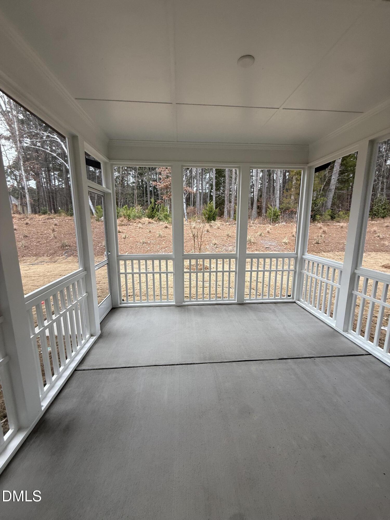 2416 Picual Way Apex, NC 27502 - Photo 6 of 17 a view of a porch with wooden floor