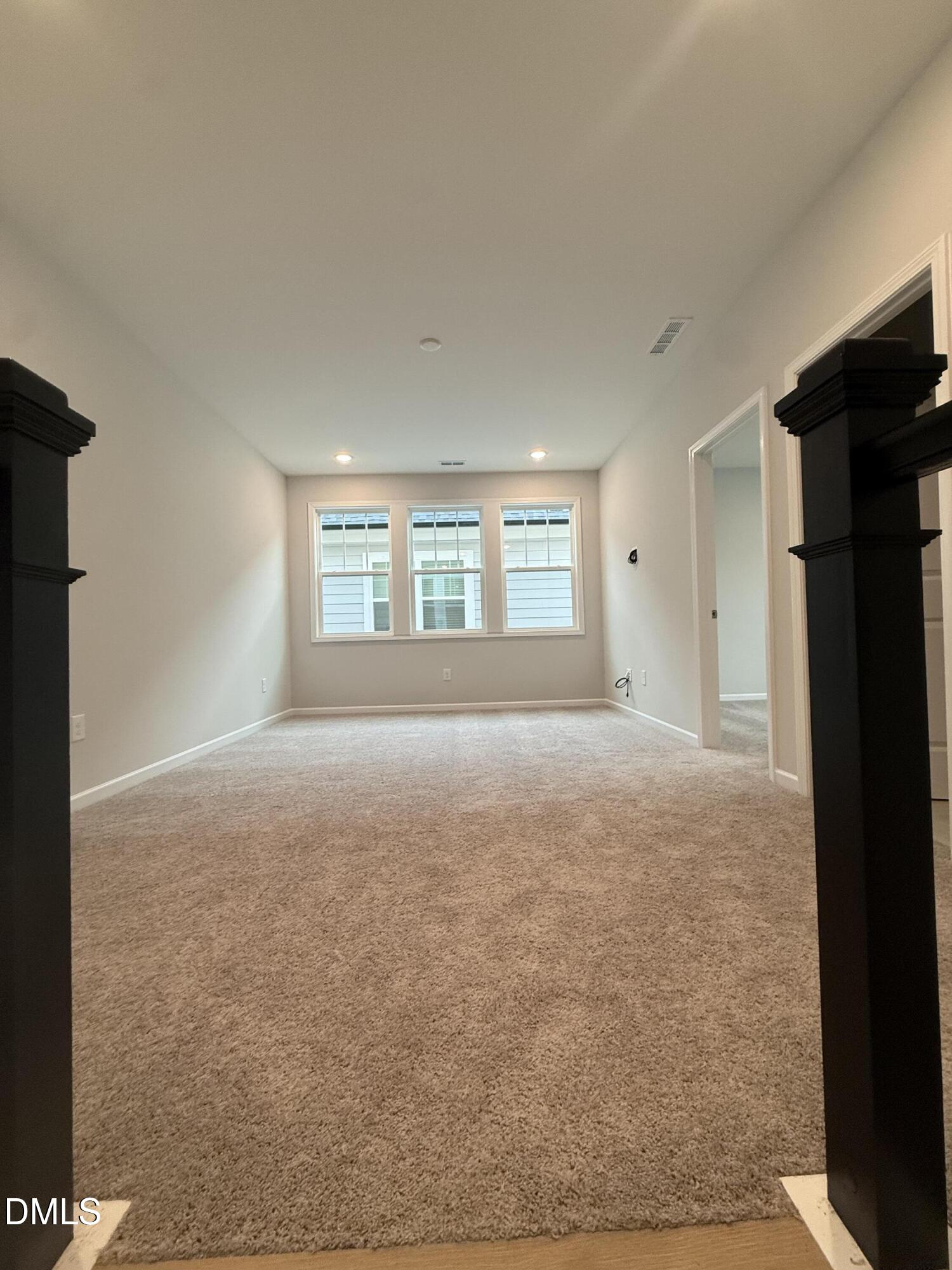 2416 Picual Way Apex, NC 27502 - Photo 7 of 17 a view of livingroom with window
