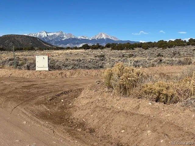 a view of ocean with a mountain