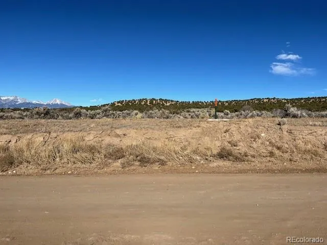 a view of ocean and mountain
