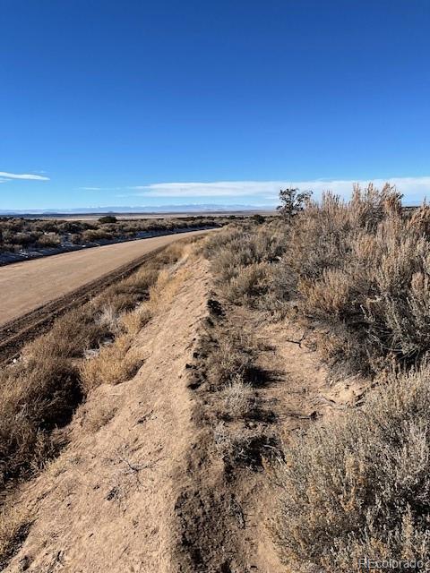 Lot 1088 Yablon Road Fort Garland, CO 81133 - Photo 23 of 25 a view of a large body of water with a building in the background
