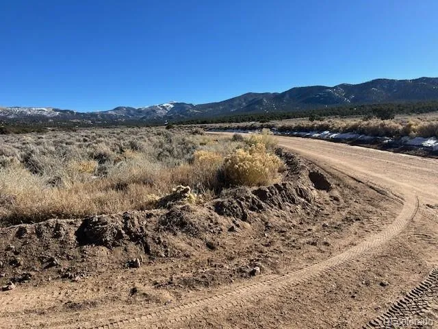 a view of lake and mountain