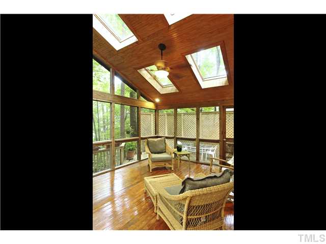 6215 Lookout Loop Raleigh, NC 27612 - Photo 13 of 25 a balcony with furniture and a potted plant