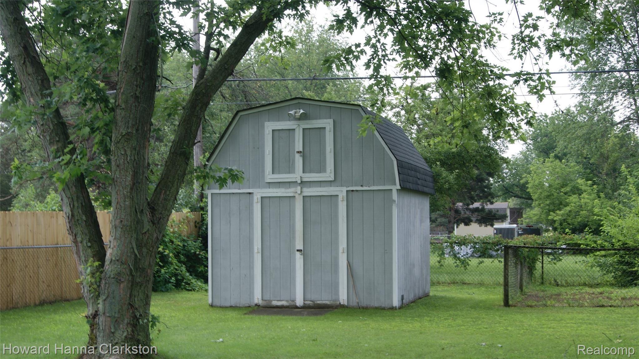 5445 Maybee Road Clarkston, MI 48346 - Photo 4 of 18 Large storage shed with loft