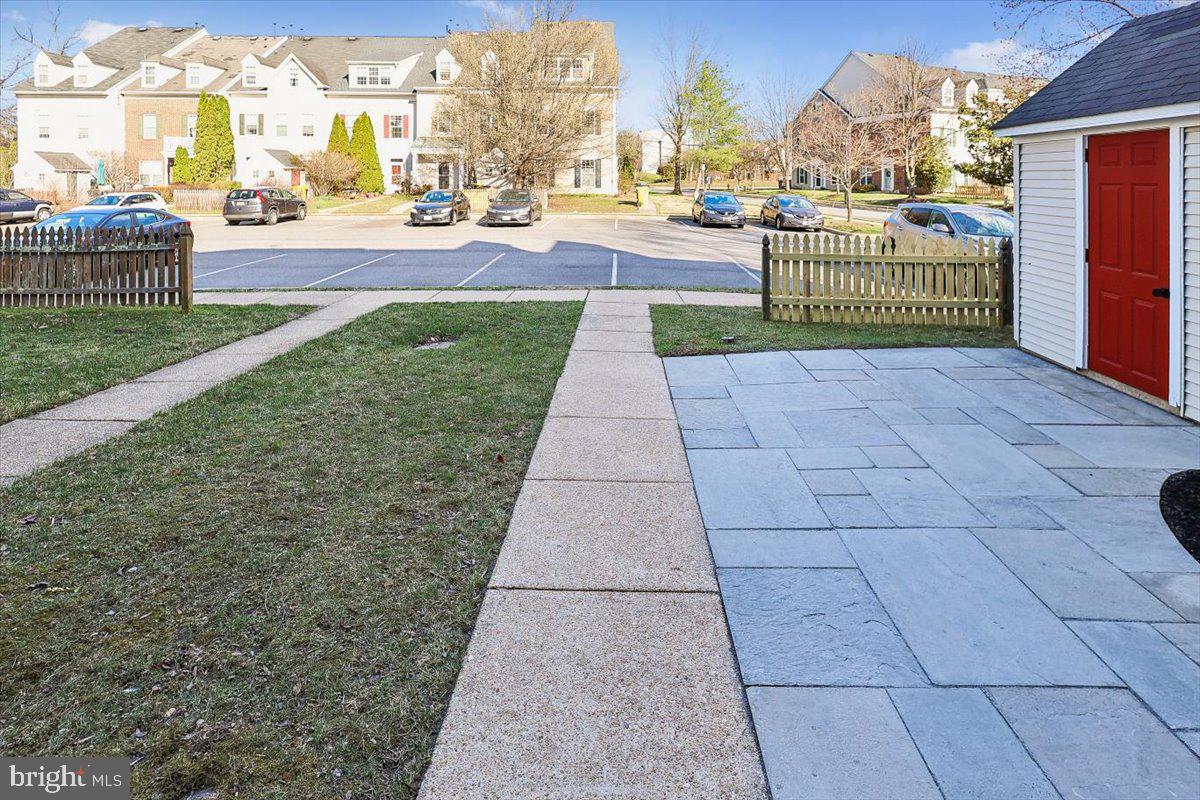 8737 Autumn Ridge Court Odenton, MD 21113 - Photo 15 of 46 a view of pathway with a building in the background