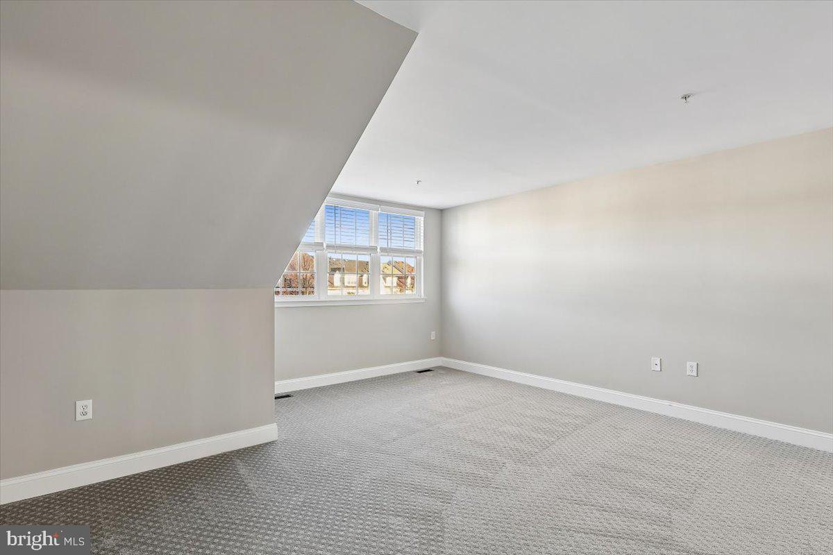 8737 Autumn Ridge Court Odenton, MD 21113 - Photo 24 of 46 an empty room with windows