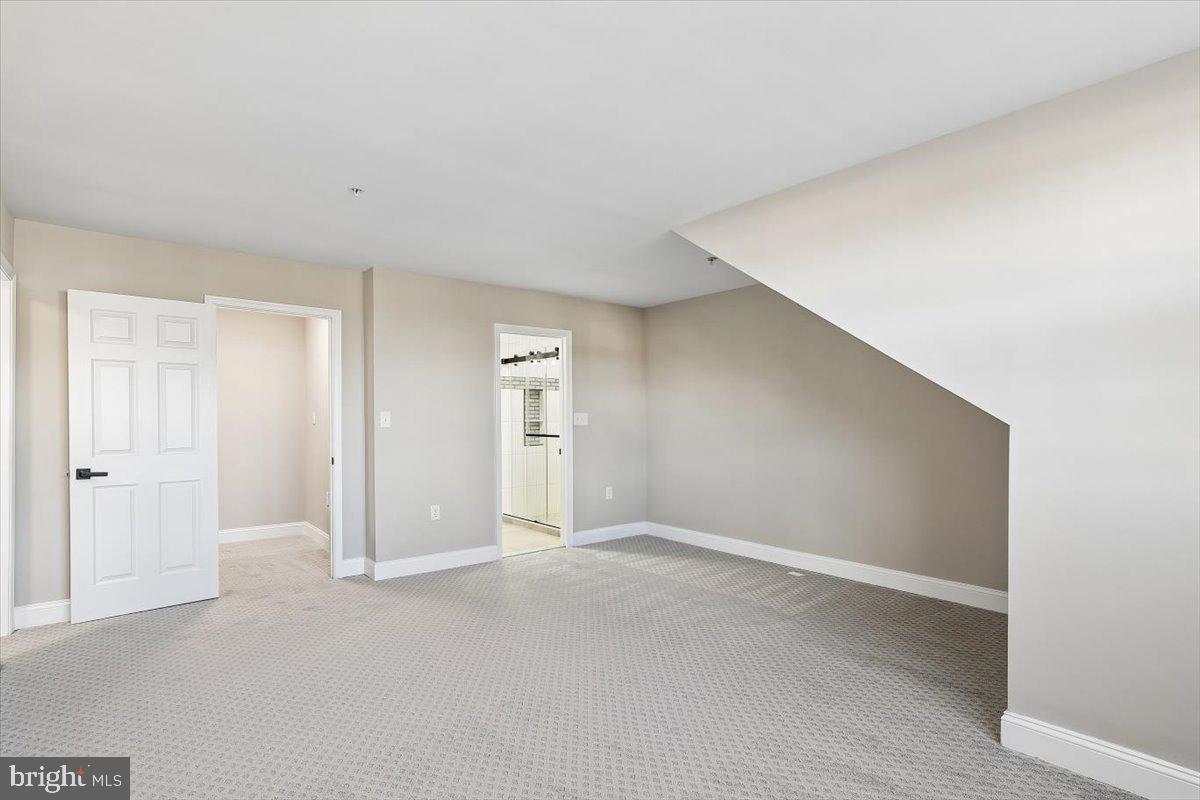 8737 Autumn Ridge Court Odenton, MD 21113 - Photo 26 of 46 a view of an empty room and closet area