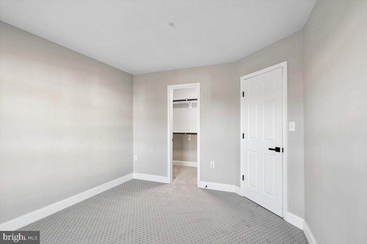8737 Autumn Ridge Court Odenton, MD 21113 - Photo 35 of 46 a view of an empty room