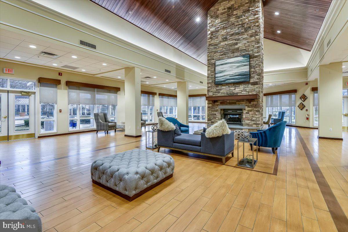 8737 Autumn Ridge Court Odenton, MD 21113 - Photo 40 of 46 a living room with furniture and a wooden floor