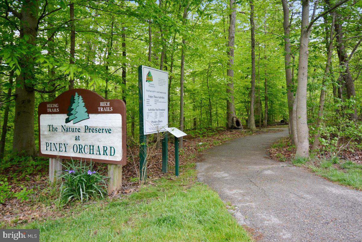 8737 Autumn Ridge Court Odenton, MD 21113 - Photo 42 of 46 a sign board with a park bench