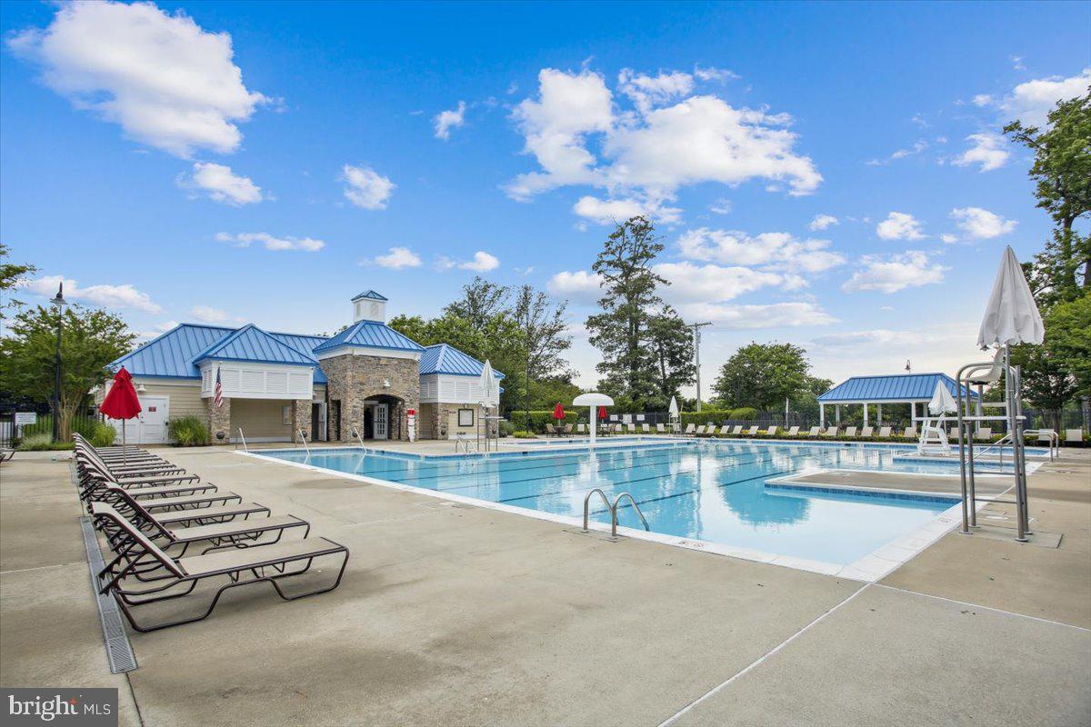 8737 Autumn Ridge Court Odenton, MD 21113 - Photo 45 of 46 a view of a house with outdoor space and sitting area