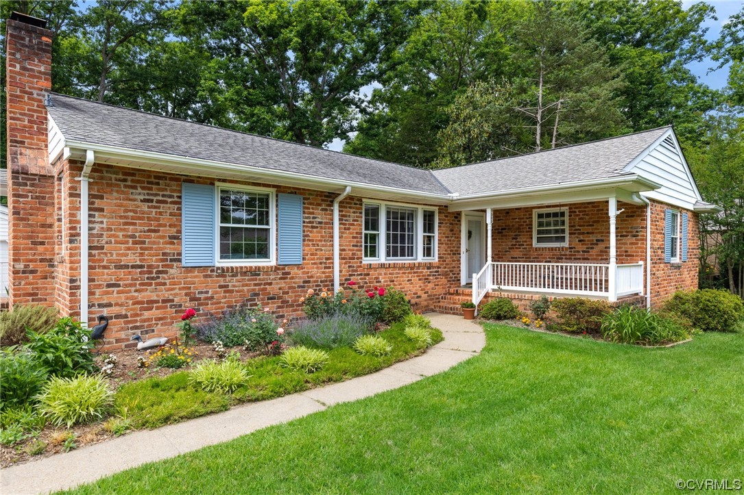 9505 Newhall Road Henrico, VA 23229 - Photo 1 of 33 a view of a house with a yard and plants
