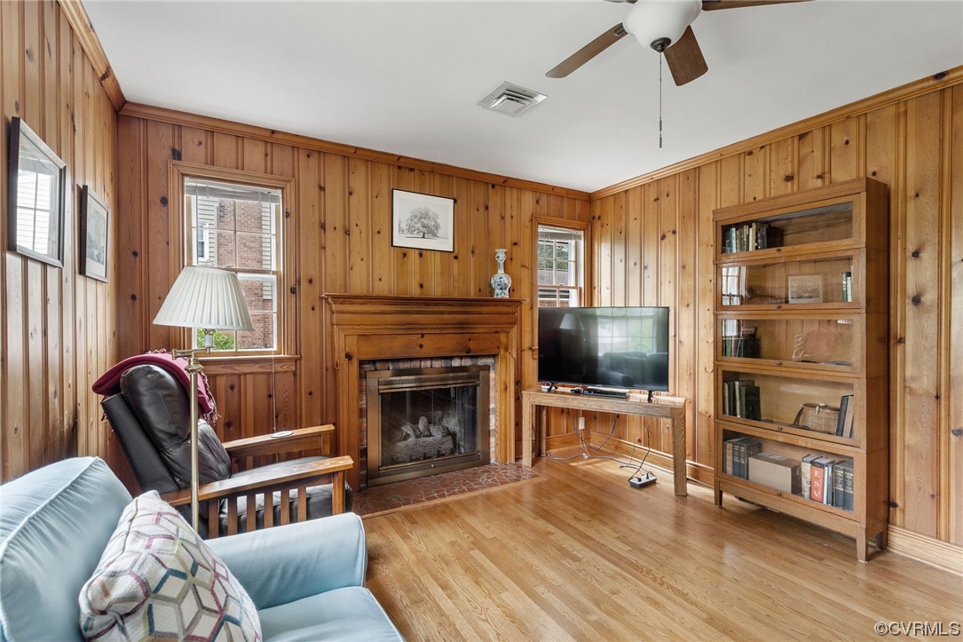 9505 Newhall Road Henrico, VA 23229 - Photo 16 of 33 a living room with furniture a flat screen tv and a fireplace