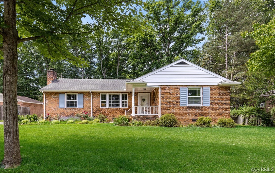 9505 Newhall Road Henrico, VA 23229 - Photo 2 of 33 a front view of a house with a yard