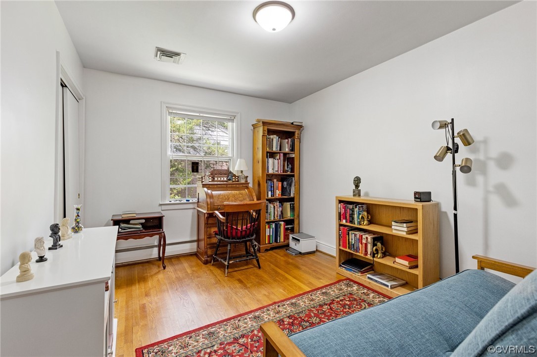 9505 Newhall Road Henrico, VA 23229 - Photo 23 of 33 a view of a workspace with furniture and a window