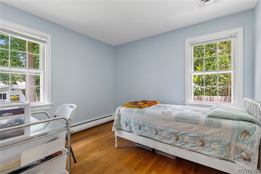 9505 Newhall Road Henrico, VA 23229 - Photo 25 of 33 a bedroom with a bed and window