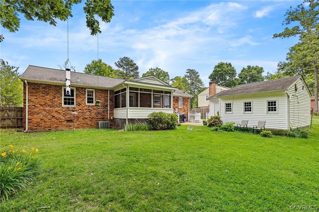 9505 Newhall Road Henrico, VA 23229 - Photo 28 of 33 a front view of a house with a garden