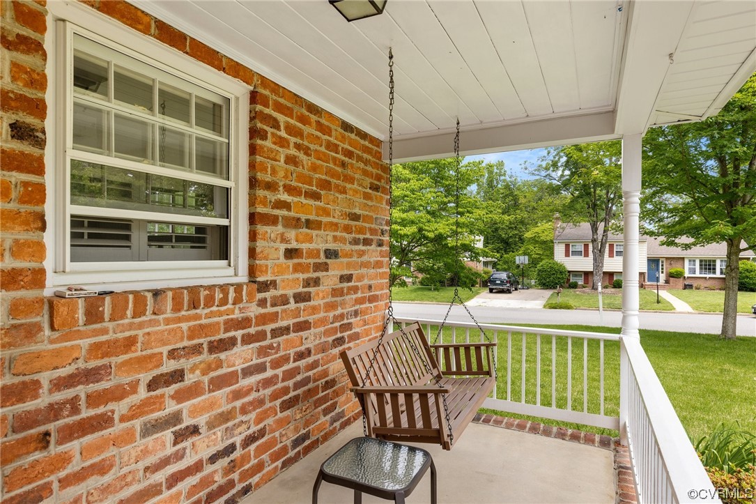 9505 Newhall Road Henrico, VA 23229 - Photo 3 of 33 a view of a chair and tables in the balcony