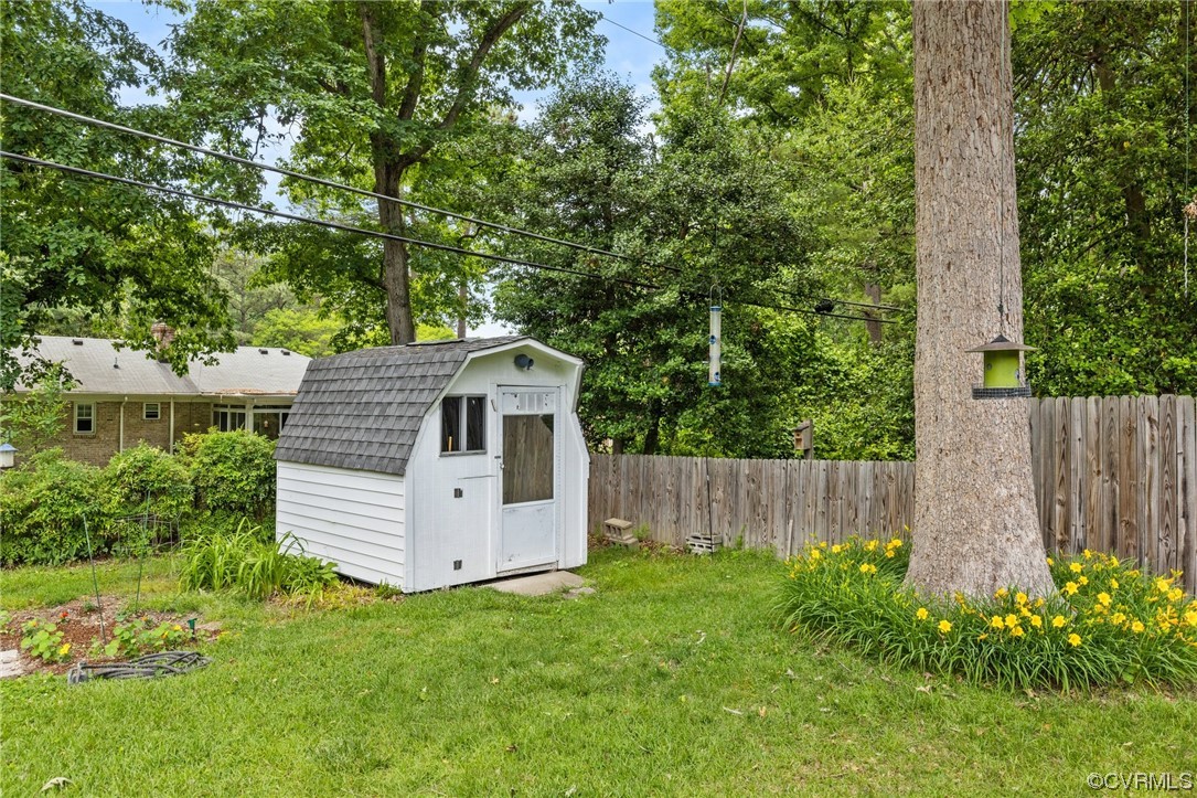 9505 Newhall Road Henrico, VA 23229 - Photo 33 of 33 a view of a house with a yard and wooden fence