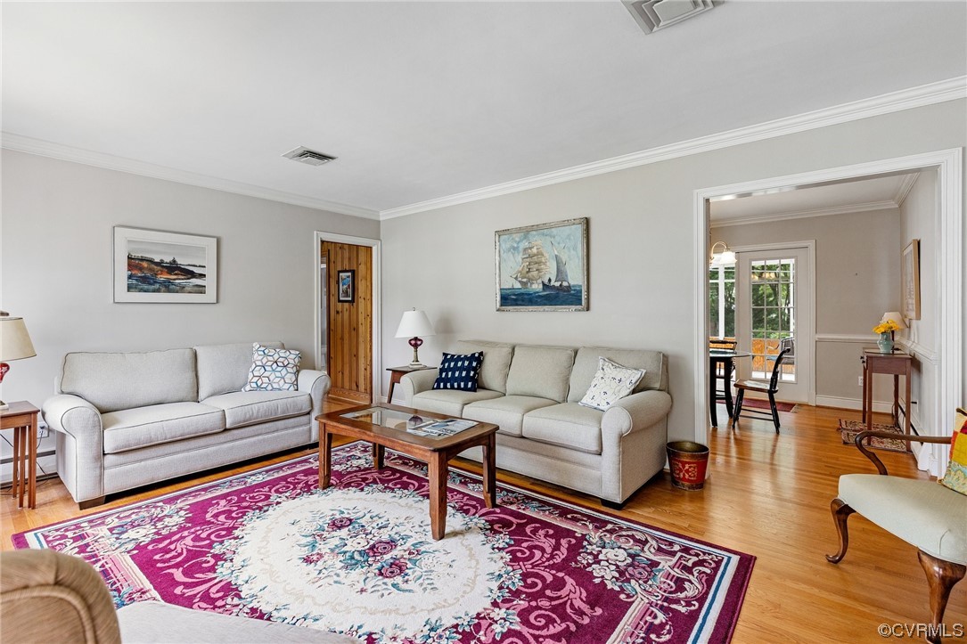 9505 Newhall Road Henrico, VA 23229 - Photo 4 of 33 a living room with furniture and a rug