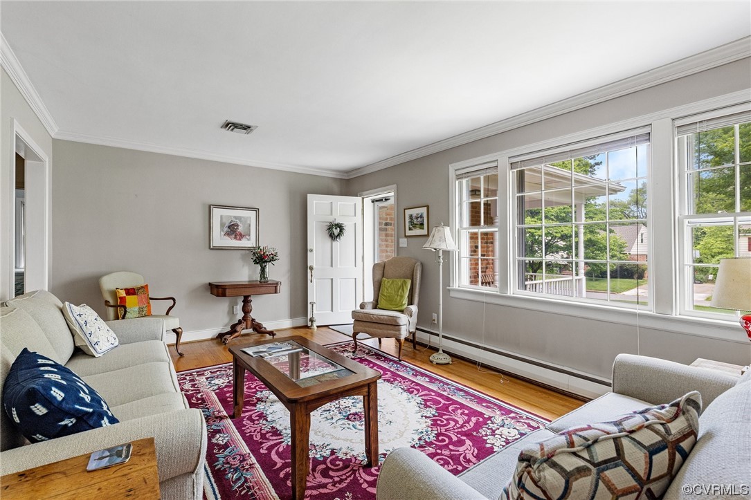 9505 Newhall Road Henrico, VA 23229 - Photo 6 of 33 a living room with furniture and a window