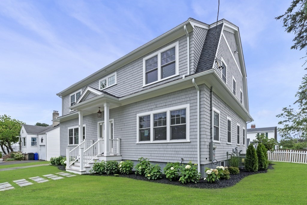 47 Glendale Road Marblehead, MA 01945 - Photo 1 of 33 a front view of a house with garden