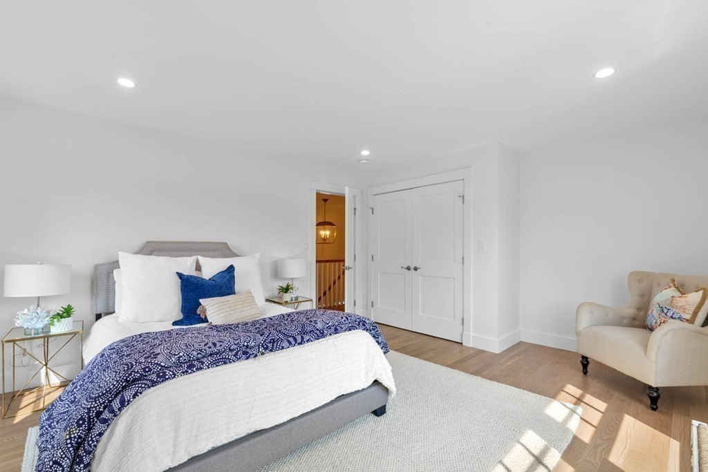 47 Glendale Road Marblehead, MA 01945 - Photo 23 of 33 a bedroom with a bed and a couch