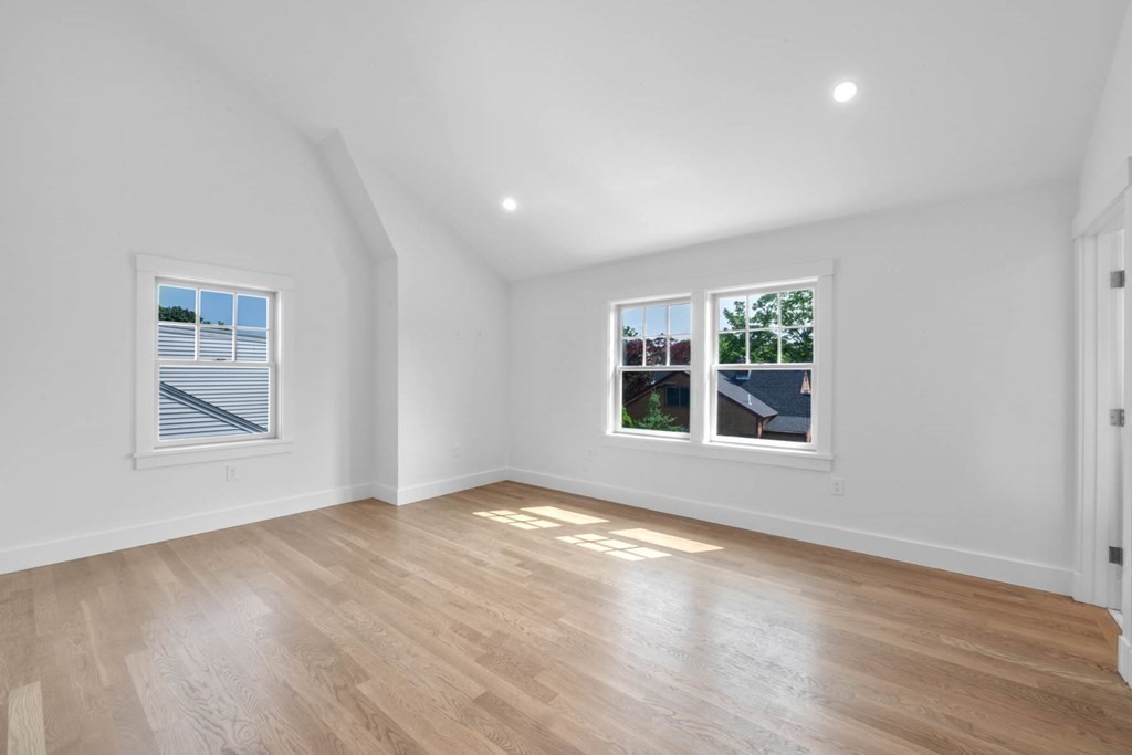 47 Glendale Road Marblehead, MA 01945 - Photo 26 of 33 a view of an empty room with a window and wooden floor