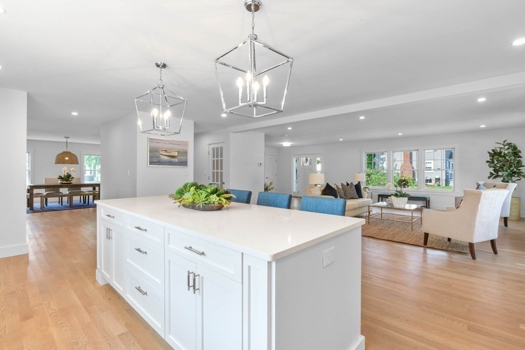 47 Glendale Road Marblehead, MA 01945 - Photo 8 of 33 a room with stainless steel appliances kitchen island a chandelier and living room view
