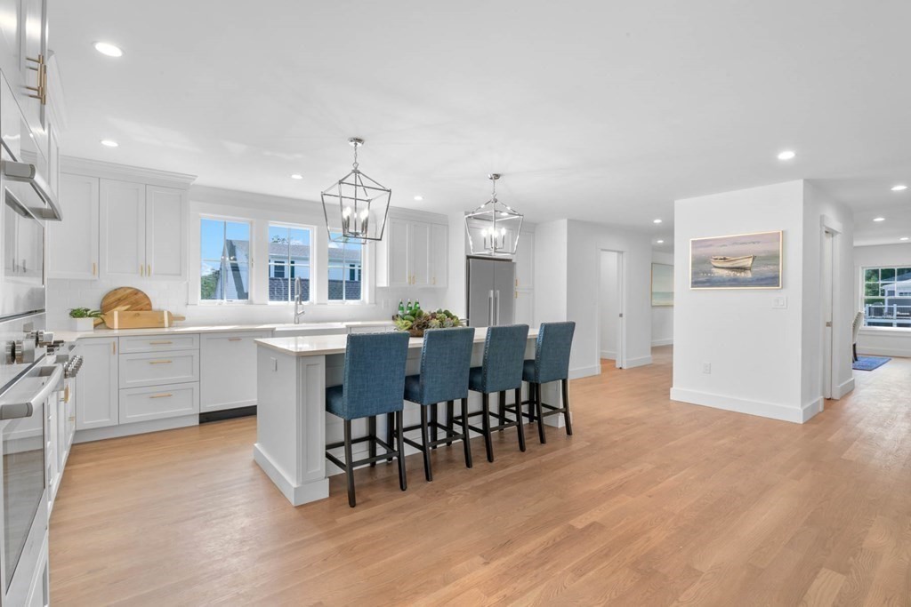 47 Glendale Road Marblehead, MA 01945 - Photo 9 of 33 a view of a dining room with furniture and chandelier