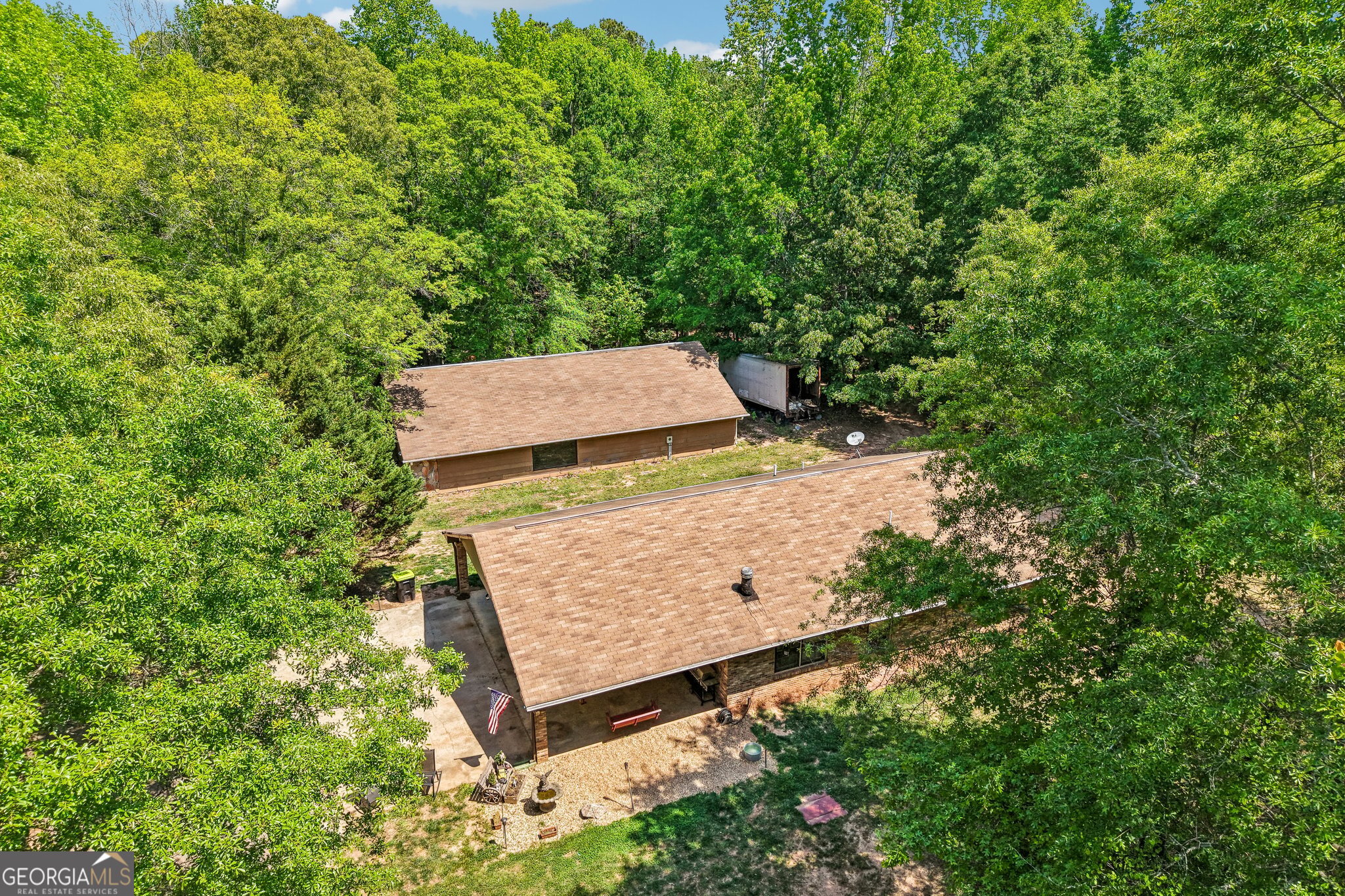 241 Busbin Road Fayetteville, GA 30215 - Photo 6 of 45 an aerial view of a house with yard and trees in the background