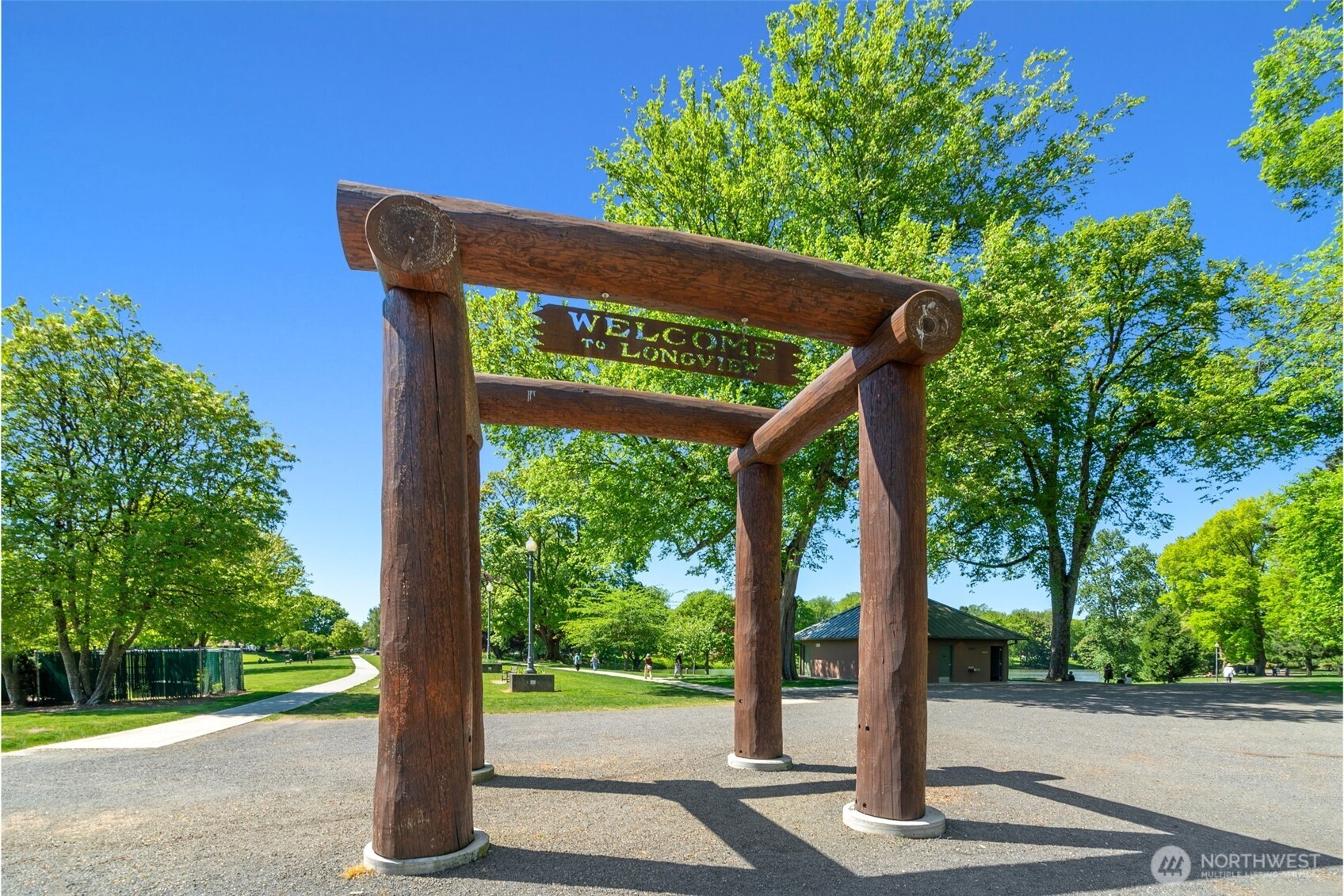 2039 Henderson Way Longview, WA 98632 - Photo 34 of 40 a view of a street sign of a tree